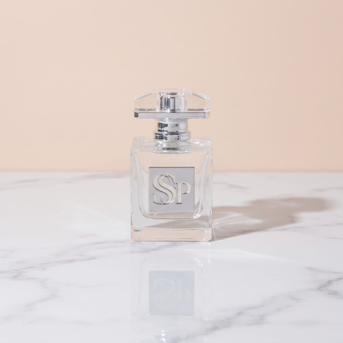 Aura Noir Extrait de Parfum, square glass bottle with a crystal cap and silver SSP plaque